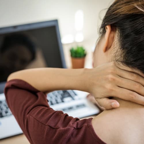 Neck Pain from Sitting at a desk all day?  Read below for tips and strategies to help.