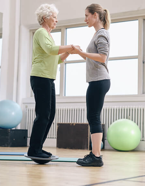 Old patient with vertigo doing exercises