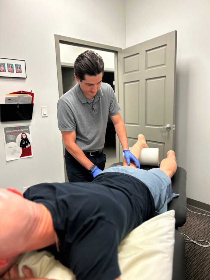 A runner's foot on a trail, highlighting the impact of overtraining and injury prevention in trail running. South Simcoe Physio offers insights.