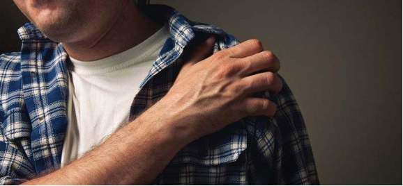 A 52-year-old carpenter undergoing rehabilitation for rotator cuff injury, showcasing the importance of physiotherapy for shoulder pain relief, Alliston