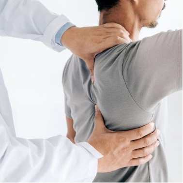 A 52-year-old carpenter undergoing rehabilitation for rotator cuff injury at South Simcoe Physio, focusing on shoulder pain relief, Alliston